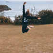 Load image into Gallery viewer, Kate jumps for joy in Bold's Born to be Bold sequin hoodie in New Plymouth New Zealand | #sayitinbold @boldornaked shop online at www.boldornaked.com