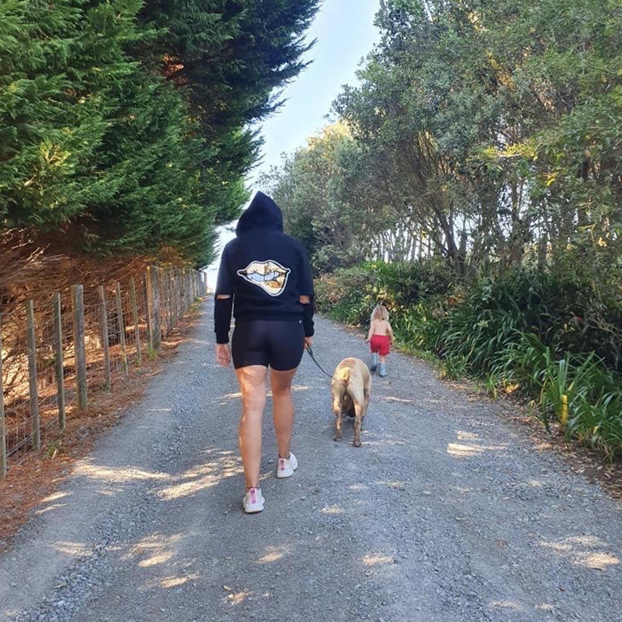 Ngahuia walks the dog in our Gold Lips Sequin hoodie in Whangarei #sayitinbold @boldornaked.com
